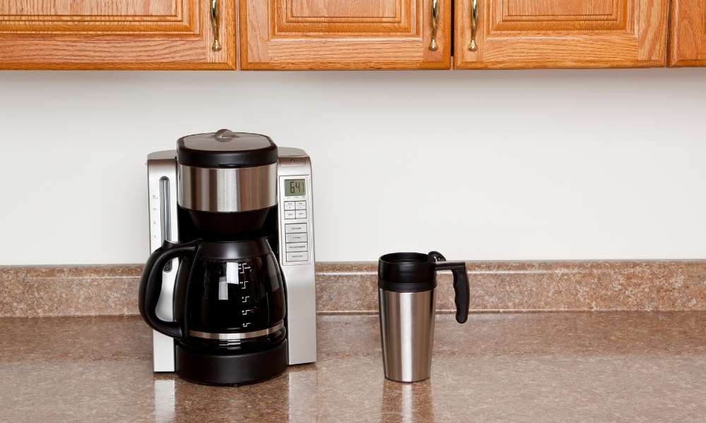 Describe How to Clean a Coffee Maker Without Vinegar