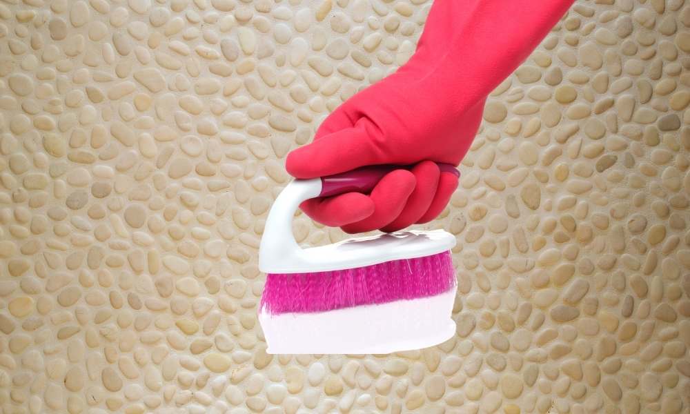 How to remove hard water stains from pebble shower floor