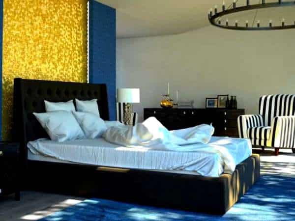 Add Sofa in gold and blue bedroom