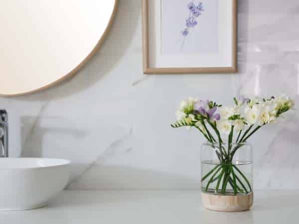 Bathroom Counter Decorated With Flower