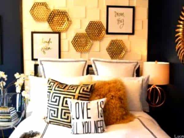 Use Artwork in gold and blue bedroom