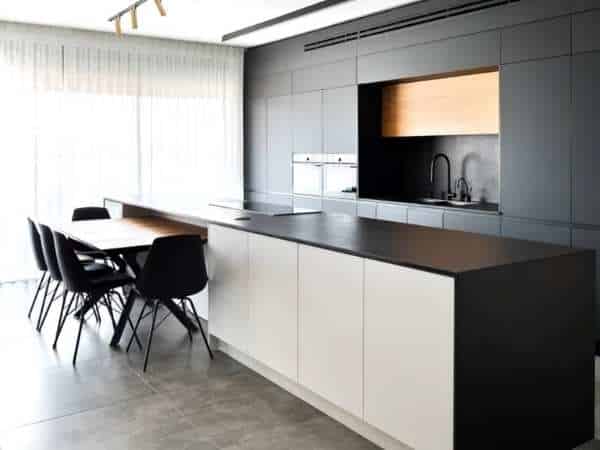 White Curtains in Black Kitchen