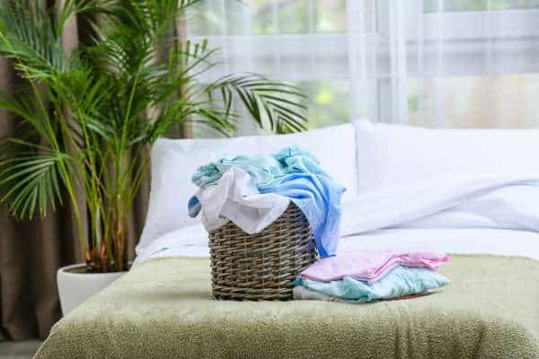 Innovative Ideas to Conceal a Laundry Basket in Your Bedroom